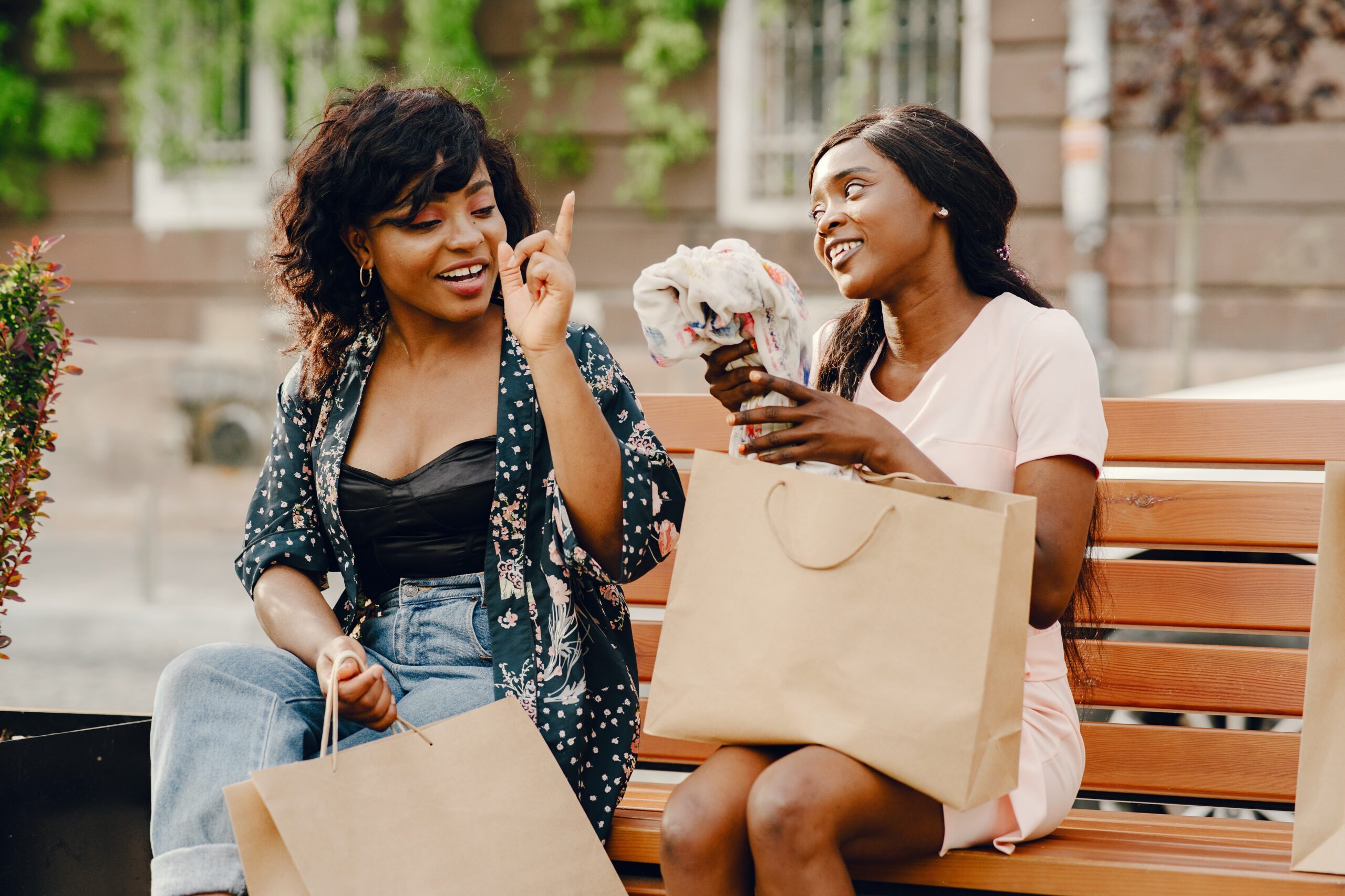 portrait-beautiful-young-black-women-with-shopping bags